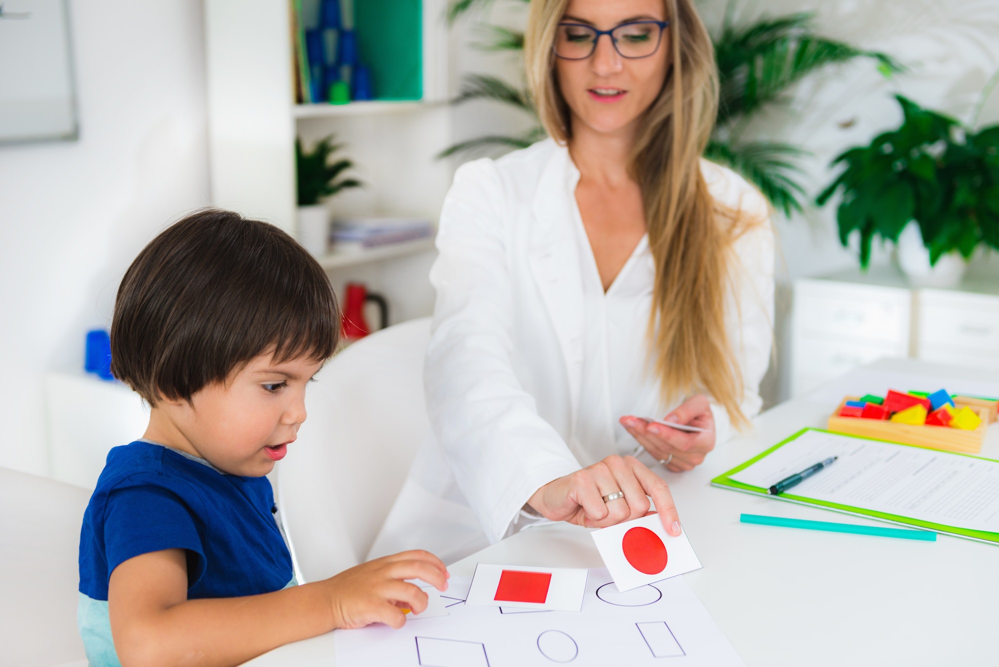 child-psychology-toddler-doing-logic-tests-with-cards.jpg