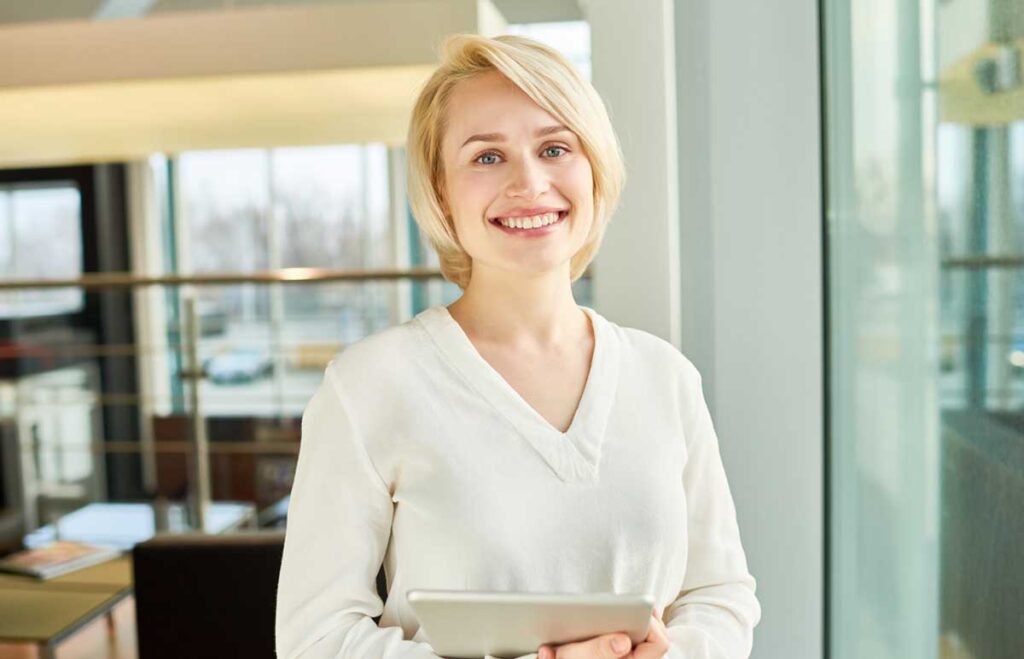 blonde female therapist smiling